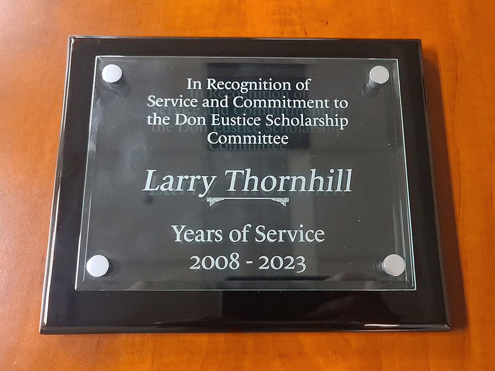 Don Eustice board member Larry Thornhill plaque